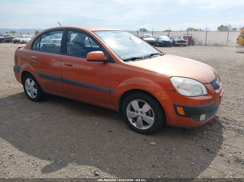 2009 Kia Rio VIN KNADE223X96515181 IAAI salvage auction — NORMAL WEAR, Clear (Colorado), sold $50 on 2026-07-29 (photo 1)