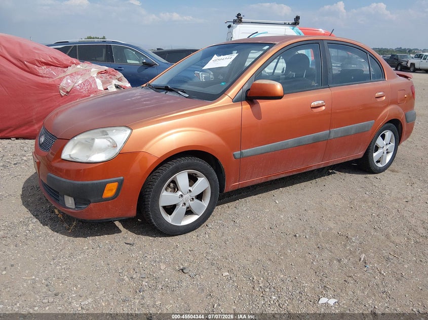 2009 Kia Rio VIN KNADE223X96515181 IAAI salvage auction — NORMAL WEAR, Clear (Colorado), sold $50 on 2026-07-29 (photo 2)