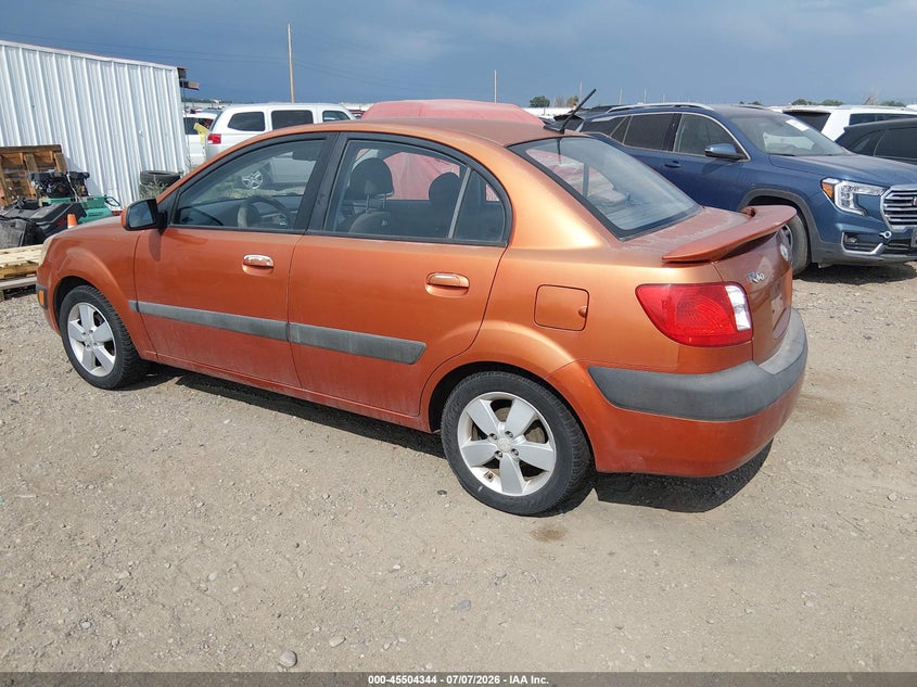 2009 Kia Rio VIN KNADE223X96515181 IAAI salvage auction — NORMAL WEAR, Clear (Colorado), sold $50 on 2026-07-29 (photo 3)