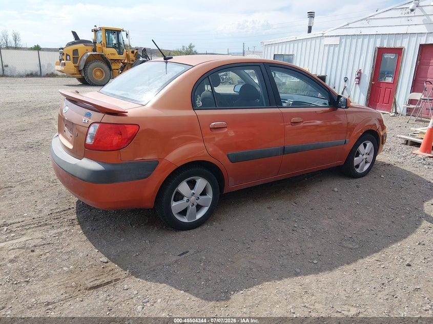 2009 Kia Rio VIN KNADE223X96515181 IAAI salvage auction — NORMAL WEAR, Clear (Colorado), sold $50 on 2026-07-29 (photo 4)