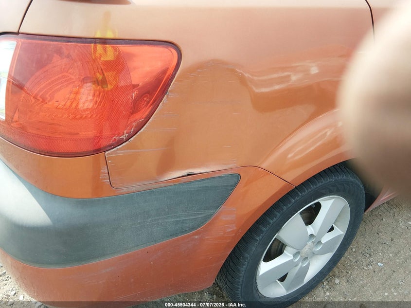 2009 Kia Rio VIN KNADE223X96515181 IAAI salvage auction — NORMAL WEAR, Clear (Colorado), sold $50 on 2026-07-29 (photo 6)