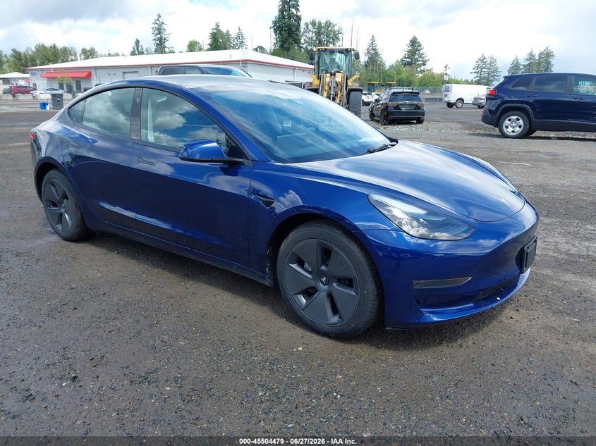 2023 Tesla Model 3 VIN 5YJ3E1EA4PF711492 IAAI salvage auction — NORMAL WEAR, Sf97 (Washington), sold $10,700 on 2026-07-29 (photo 1)