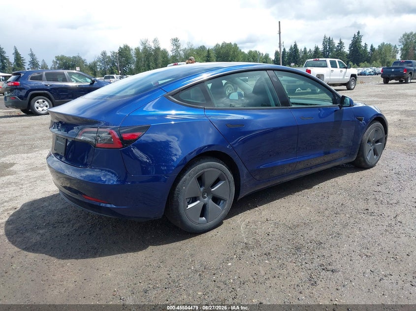2023 Tesla Model 3 VIN 5YJ3E1EA4PF711492 IAAI salvage auction — NORMAL WEAR, Sf97 (Washington), sold $10,700 on 2026-07-29 (photo 4)