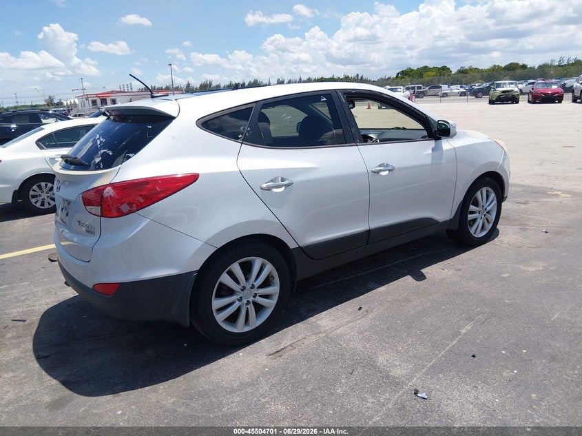 2013 Hyundai Tucson VIN KM8JU3AC5DU546922 IAAI salvage auction — ROOF, Rebuildable (Florida), sold $2,700 on 2026-07-30 (photo 4)