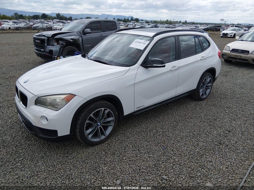 2013 BMW X1 VIN WBAVM5C58DVV90808 IAAI salvage auction — REAR END, Salvage (Oregon), sold $1,750 on 2026-08-26 (photo 2)