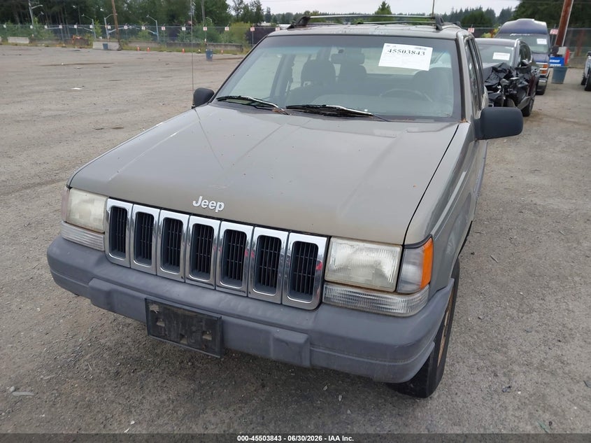 1996 Jeep Grand cherokee VIN 1J4EX58S0TC103002 IAAI salvage auction — NORMAL WEAR, Clear (Washington), sold $350 on 2026-07-08 (photo 6)
