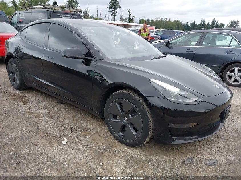 2023 Tesla Model 3 VIN 5YJ3E1EA5PF661685 IAAI salvage auction — SIDE, Salvage Title, sold $9,300 on 2026-07-16 (photo 1)