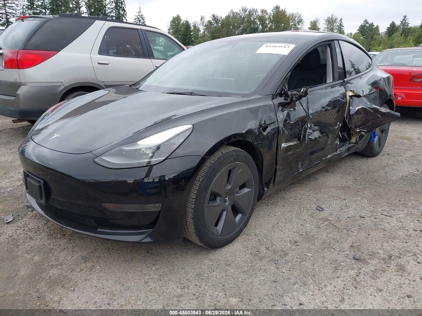 2023 Tesla Model 3 VIN 5YJ3E1EA5PF661685 IAAI salvage auction — SIDE, Salvage Title, sold $9,300 on 2026-07-16 (photo 2)