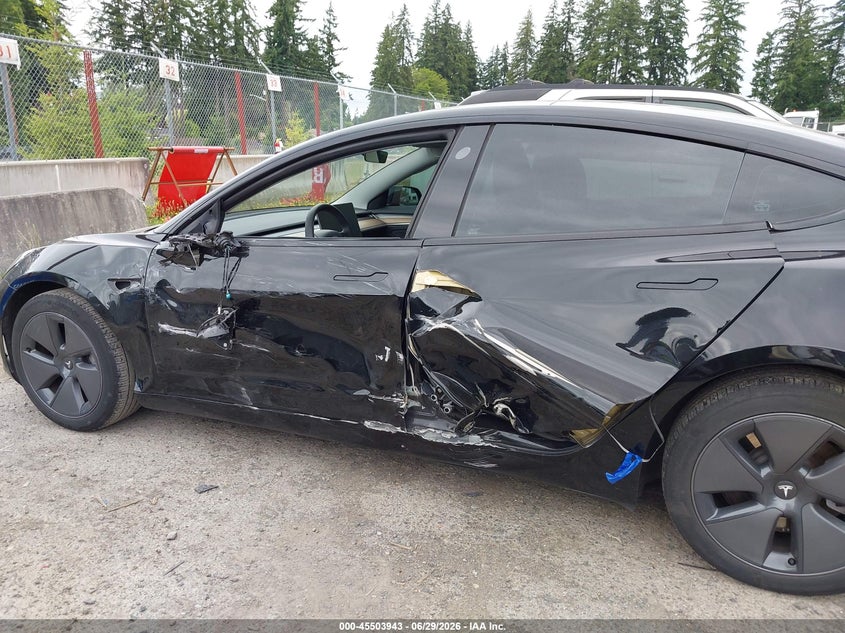 2023 Tesla Model 3 VIN 5YJ3E1EA5PF661685 IAAI salvage auction — SIDE, Salvage Title, sold $9,300 on 2026-07-16 (photo 6)