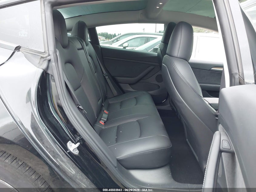 2023 Tesla Model 3 VIN 5YJ3E1EA5PF661685 IAAI salvage auction — SIDE, Salvage Title, sold $9,300 on 2026-07-16 (photo 8)