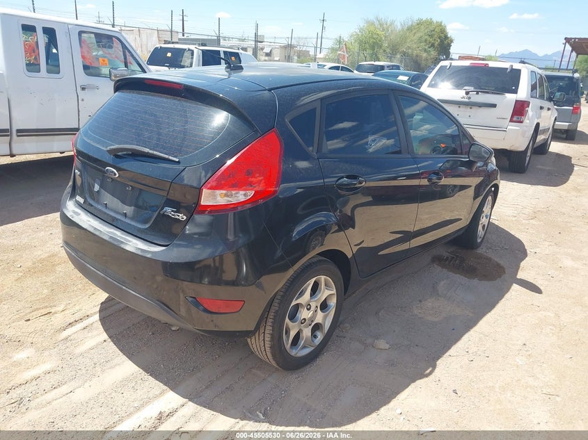 2011 Ford Fiesta VIN 3FADP4FJ1BM167865 IAAI salvage auction — NORMAL WEAR, Clear-Dealer Only (Arizona), sold $250 on 2026-07-30 (photo 4)
