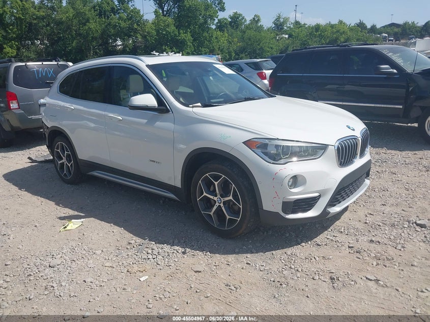 2017 BMW X1 VIN WBXHT3C31H5F84673 IAAI salvage auction — REAR END, Salvage Title, sold $3,850 on 2026-07-16 (photo 1)