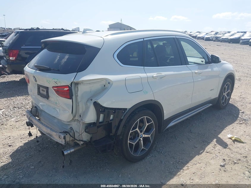 2017 BMW X1 VIN WBXHT3C31H5F84673 IAAI salvage auction — REAR END, Salvage Title, sold $3,850 on 2026-07-16 (photo 4)