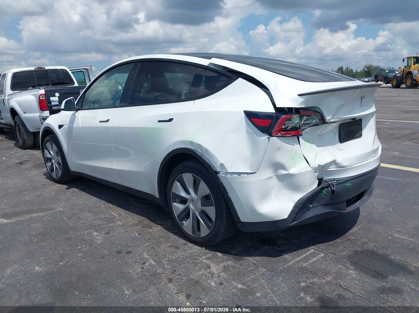 2023 Tesla Model y VIN 7SAYGDEF6PA049086 IAAI salvage auction — LEFT REAR, Salvage Title, sold $12,750 on 2026-09-07 (photo 3)