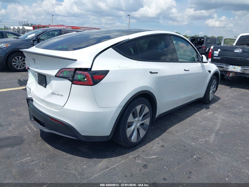 2023 Tesla Model y VIN 7SAYGDEF6PA049086 IAAI salvage auction — LEFT REAR, Salvage Title, sold $12,750 on 2026-09-07 (photo 4)