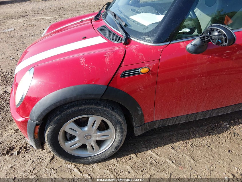 2006 Mini Cooper VIN WMWRC33586TJ76077 IAAI salvage auction — NORMAL WEAR, Clear-Endorsement (Wisconsin), sold $350 on 2026-07-22 (photo 6)