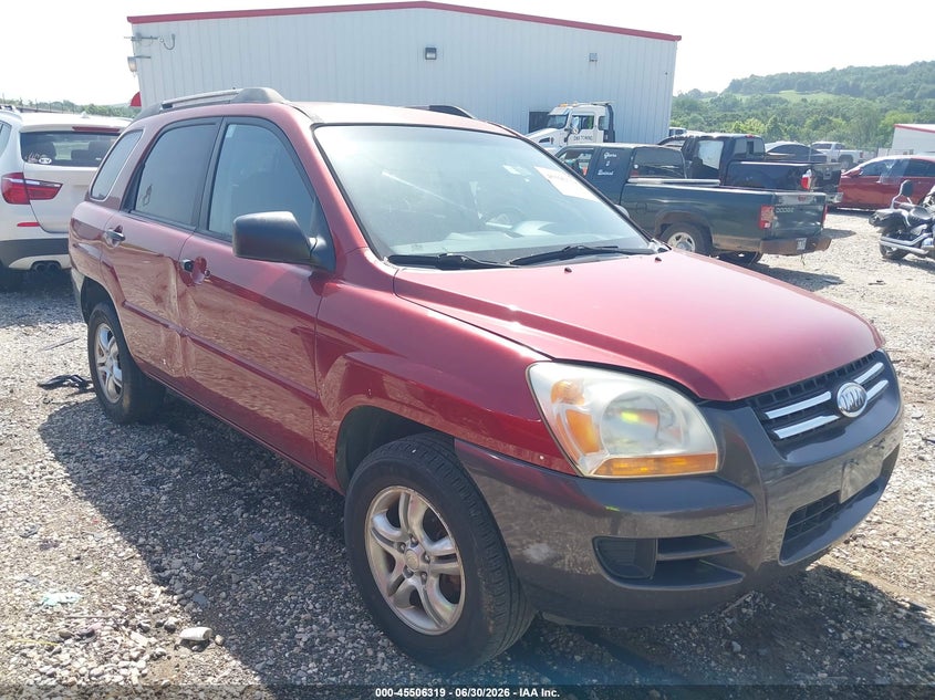 2007 Kia Sportage VIN KNDJF723577311282 IAAI salvage auction — NORMAL WEAR, Clear (Arkansas), sold $300 on 2026-07-09 (photo 1)