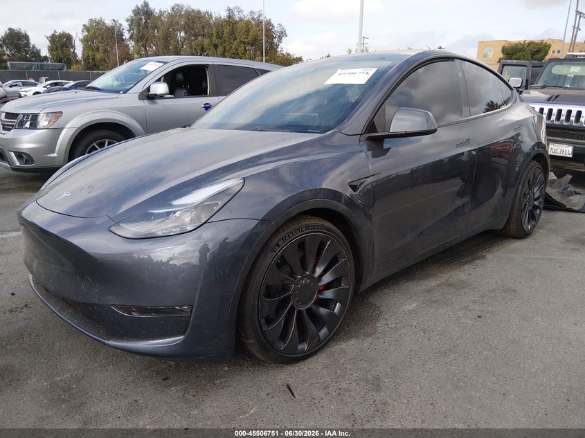 2023 Tesla Model y VIN 7SAYGDEF1PF838202 IAAI salvage auction — RIGHT FRONT, Salvage (California), sold $10,900 on 2026-07-30 (photo 2)