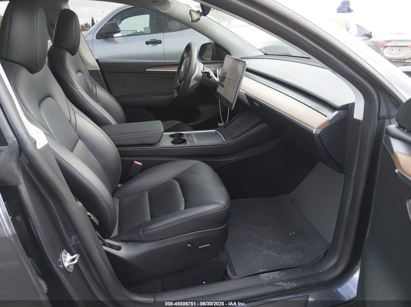 2023 Tesla Model y VIN 7SAYGDEF1PF838202 IAAI salvage auction — RIGHT FRONT, Salvage (California), sold $10,900 on 2026-07-30 (photo 5)