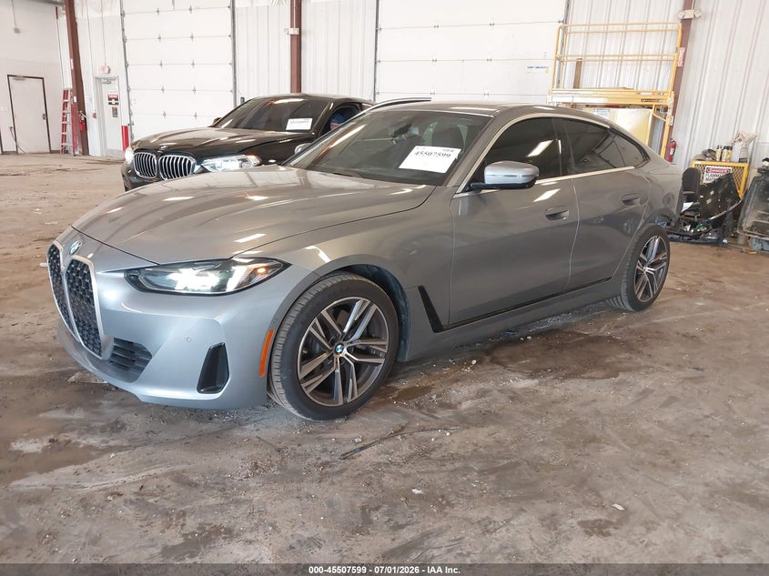 2026 BMW 4er VIN WBA33FB02TFV47855 IAAI salvage auction — REAR END, Clear (Michigan), sold $38,450 on 2026-08-24 (photo 2)