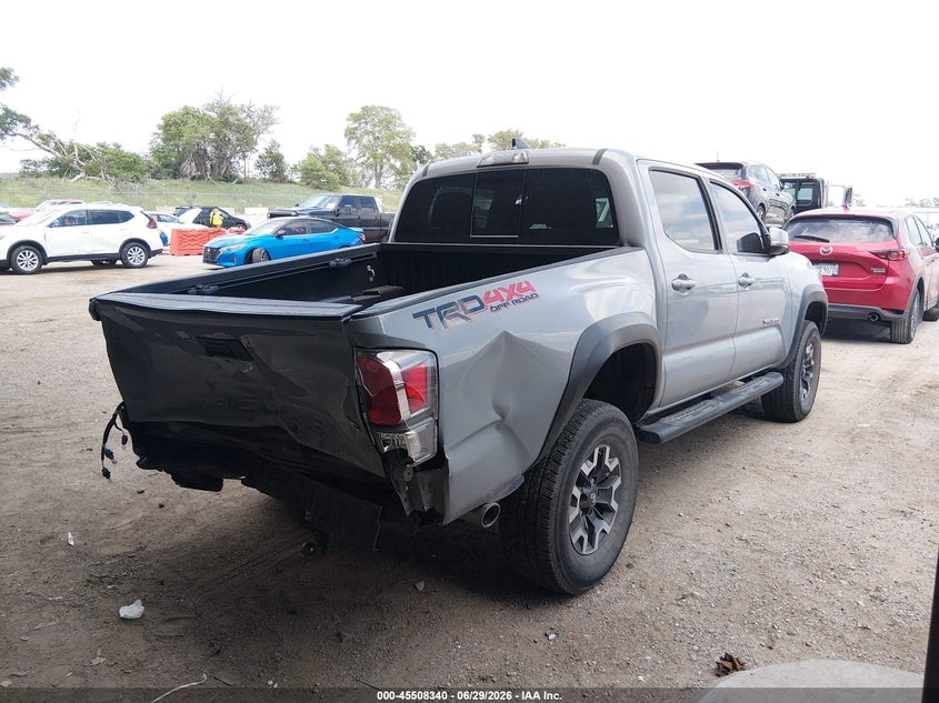 2020 Toyota Tacoma VIN 3TMCZ5AN1LM302358 IAAI salvage auction — REAR END, Salvage (Nebraska), sold $9,800 on 2026-07-30 (photo 4)