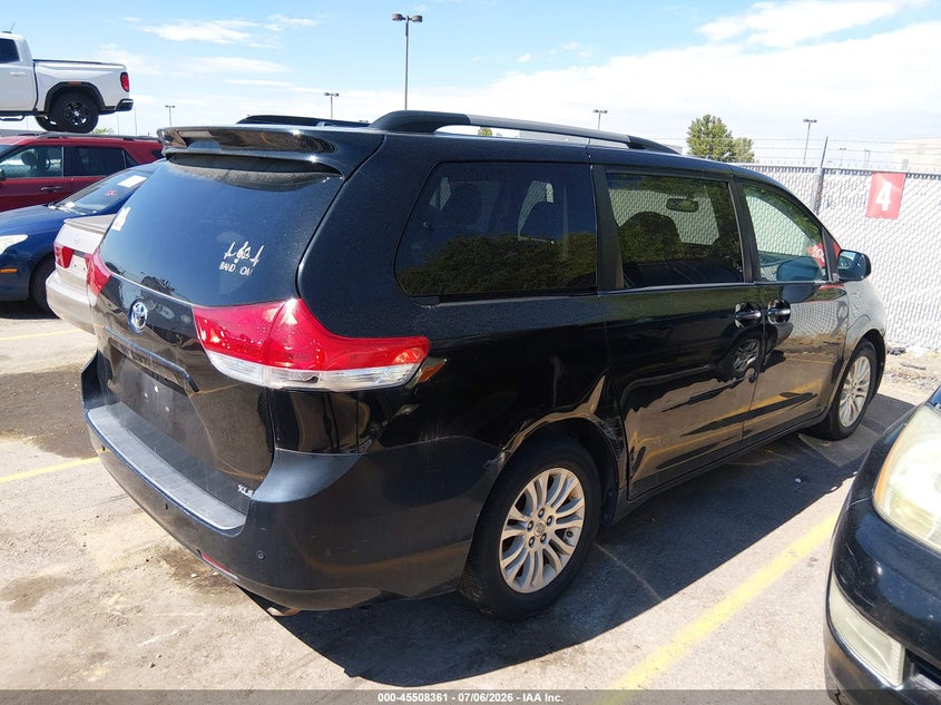 2014 Toyota Sienna VIN 5TDYK3DCXES473959 IAAI salvage auction — NORMAL WEAR, Clear (Idaho), sold $2,025 on 2026-07-10 (photo 4)