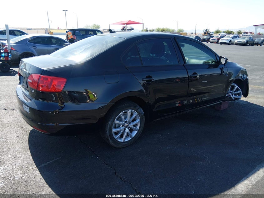 2011 Volkswagen Jetta VIN 3VWDX7AJ1BM396739 IAAI salvage auction — SIDE, Salvage (Nevada), sold $550 on 2026-10-03 (photo 4)