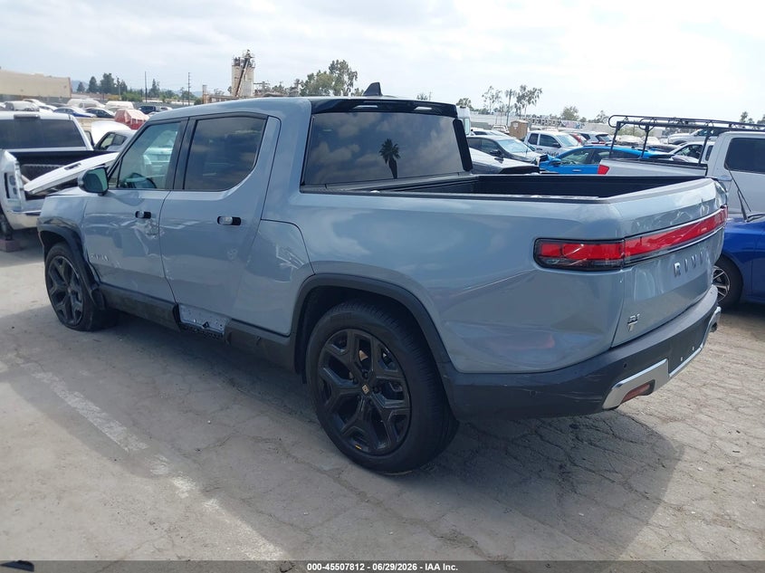 2023 Rivian R1t VIN 7FCTGBAA7PN029398 IAAI salvage auction — LEFT FRONT, Salvage Title, sold $16,500 on 2026-09-03 (photo 3)