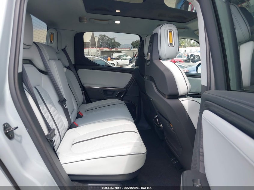 2023 Rivian R1t VIN 7FCTGBAA7PN029398 IAAI salvage auction — LEFT FRONT, Salvage Title, sold $16,500 on 2026-09-03 (photo 8)