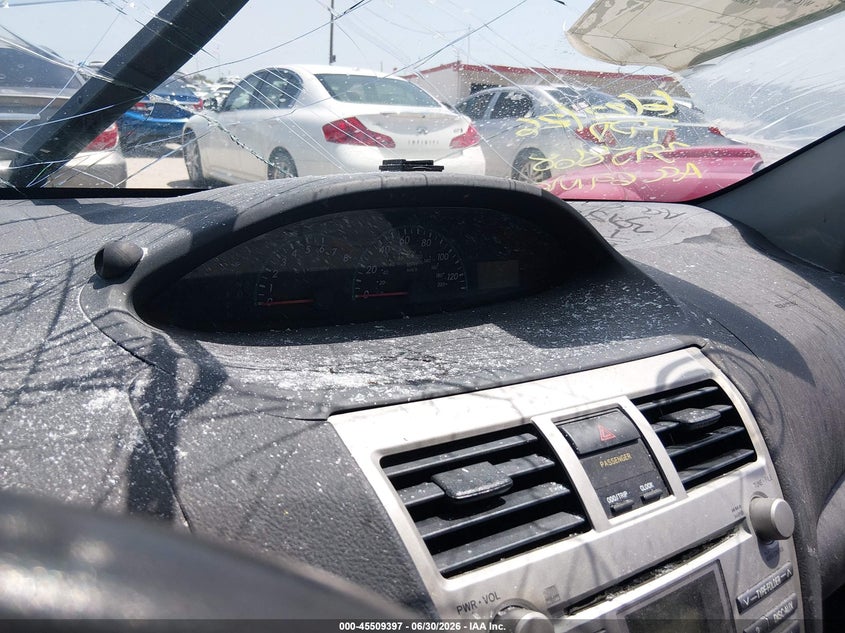 2011 Toyota Yaris VIN JTDBT4K39B1409495 IAAI salvage auction — NORMAL WEAR, Original (Texas), sold $1,000 on 2026-07-13 (photo 7)