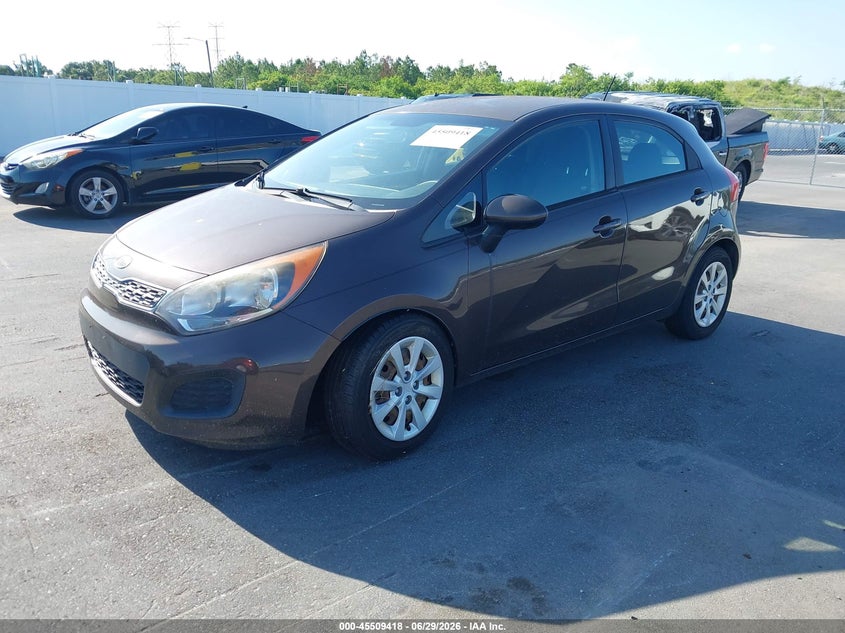 2012 Kia Rio VIN KNADN5A36C6027808 IAAI salvage auction — NORMAL WEAR, Clear (Florida), sold $525 on 2026-07-29 (photo 2)