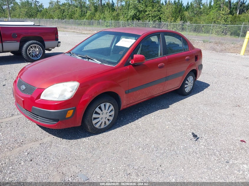 2009 Kia Rio VIN KNADE223496519260 IAAI salvage auction — NORMAL WEAR, Clear (Florida), sold $250 on 2026-07-28 (photo 2)