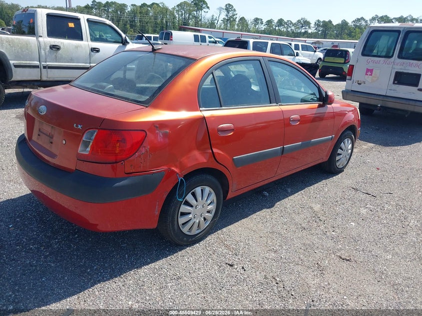 2009 Kia Rio VIN KNADE223496519260 IAAI salvage auction — NORMAL WEAR, Clear (Florida), sold $250 on 2026-07-28 (photo 4)