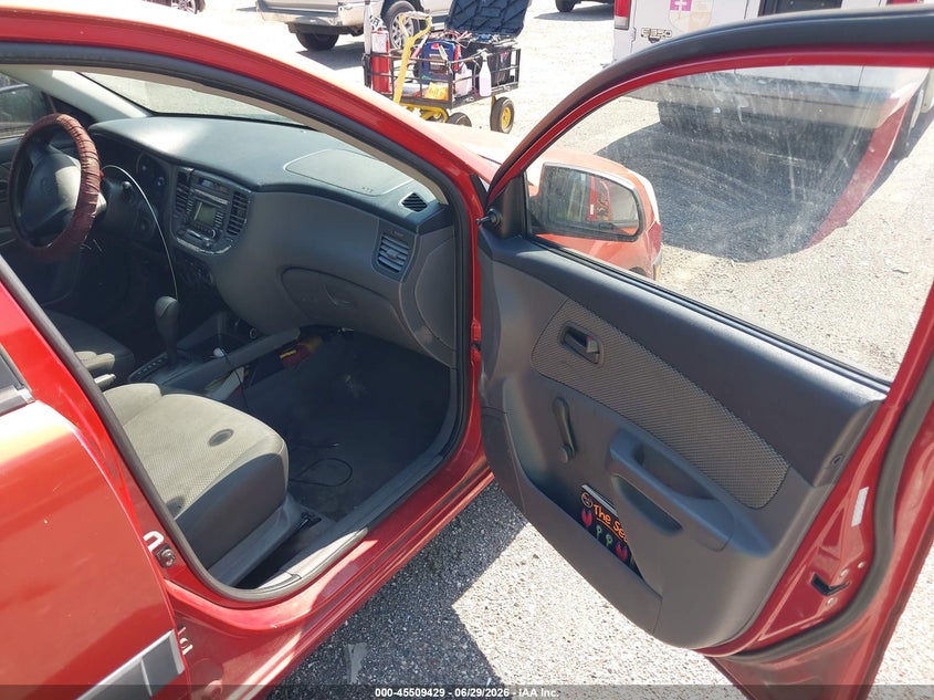 2009 Kia Rio VIN KNADE223496519260 IAAI salvage auction — NORMAL WEAR, Clear (Florida), sold $250 on 2026-07-28 (photo 5)