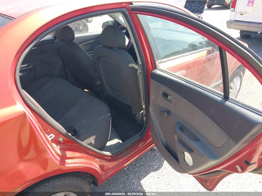 2009 Kia Rio VIN KNADE223496519260 IAAI salvage auction — NORMAL WEAR, Clear (Florida), sold $250 on 2026-07-28 (photo 8)