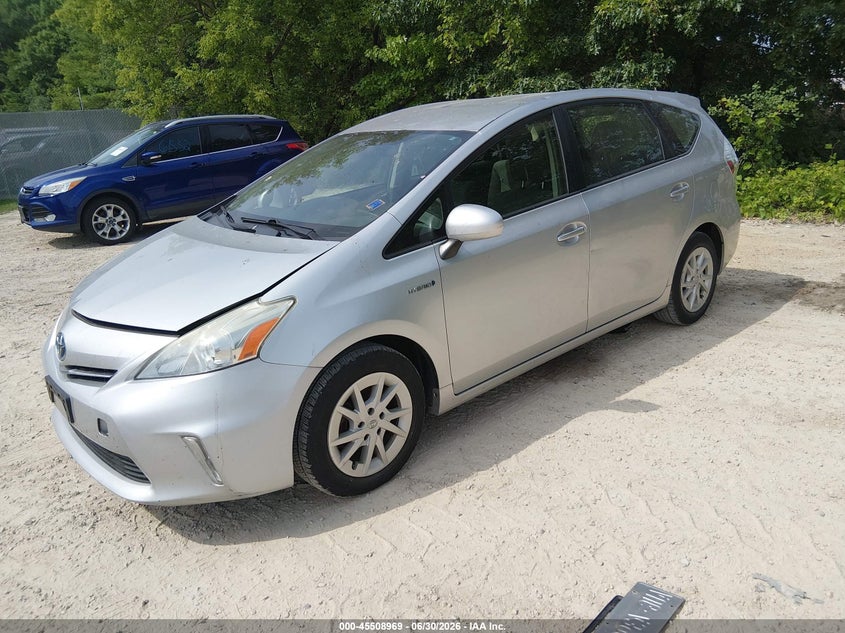 2013 Toyota Prius v VIN JTDZN3EU5D3282792 IAAI salvage auction — NORMAL WEAR, Salvage Title, sold $1,100 on 2026-07-15 (photo 2)