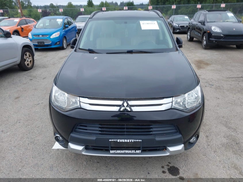 2015 Mitsubishi Outlander VIN JA4AD3A31FZ006620 IAAI salvage auction — NORMAL WEAR, Clear (Washington), sold $325 on 2026-07-12 (photo 6)