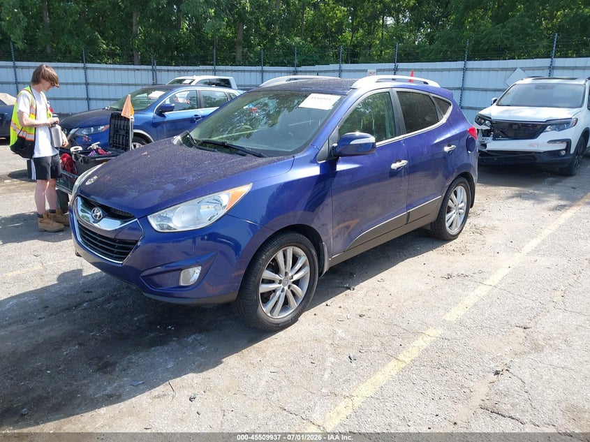 2013 Hyundai Tucson VIN KM8JUCAC6DU663392 IAAI salvage auction — NORMAL WEAR, Clear (Michigan), sold $1,350 on 2026-07-30 (photo 2)