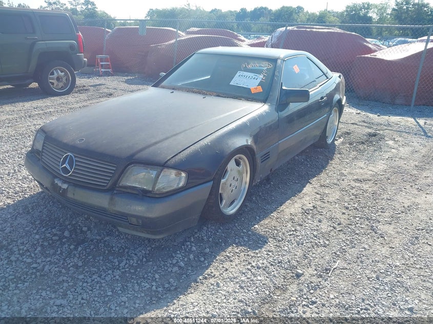 1992 Mercedes-benz 500 VIN WDBFA66E1NF064998 IAAI salvage auction — NORMAL WEAR, Clear (Florida), sold $275 on 2026-07-30 (photo 2)