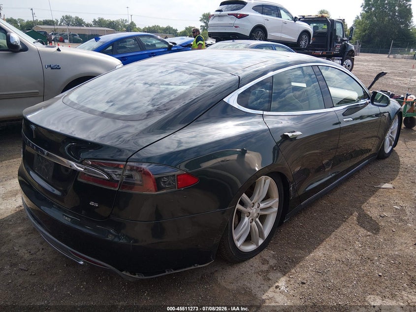 2013 Tesla Model s VIN 5YJSA1CN2DFP05490 IAAI salvage auction — NORMAL WEAR, Salvage Title, sold $575 on 2026-07-29 (photo 4)