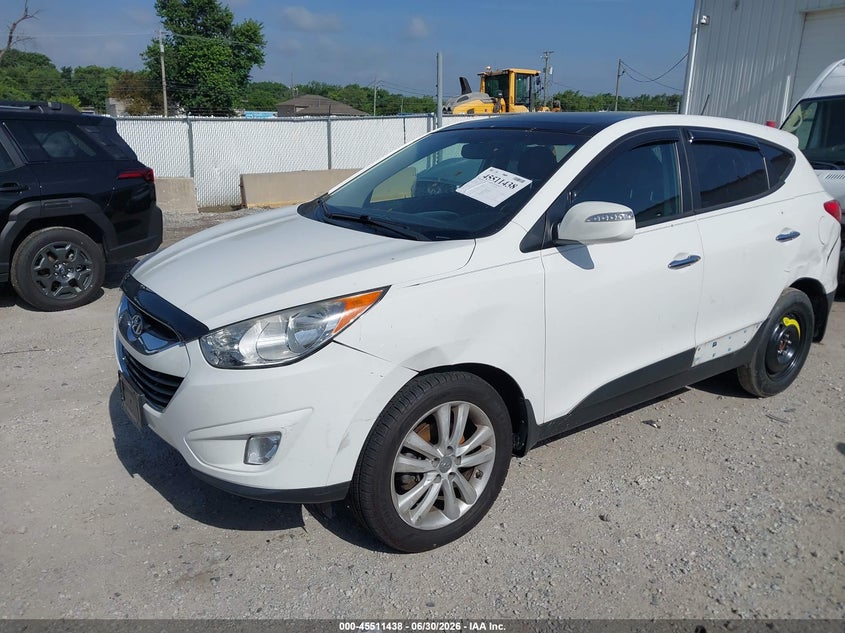 2013 Hyundai Tucson VIN KM8JU3AC6DU685313 IAAI salvage auction — SIDE, Salvage Title, sold $2,250 on 2026-08-01 (photo 2)