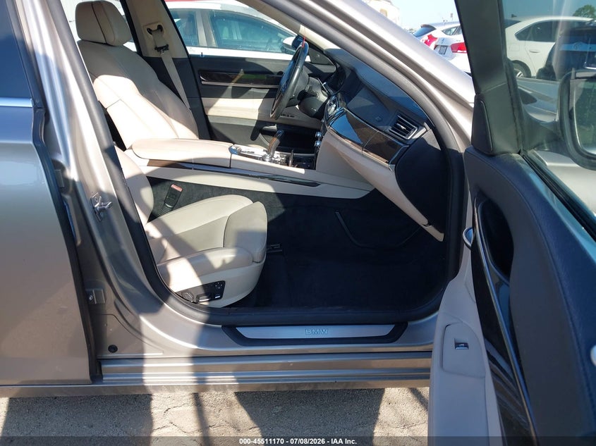 2011 BMW 7 series VIN WBAKA8C51BCY36877 IAAI salvage auction — NORMAL WEAR, Original (Texas), sold $1,325 on 2026-07-28 (photo 5)