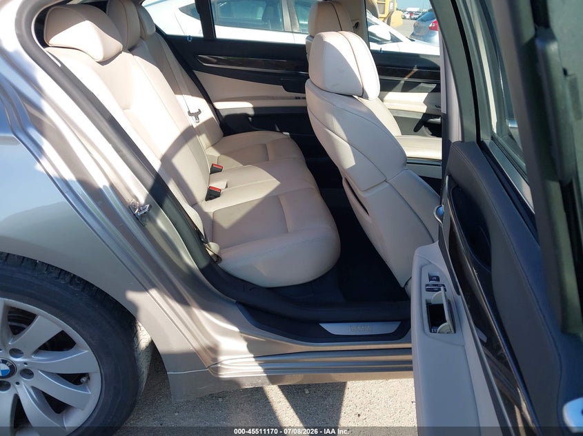 2011 BMW 7 series VIN WBAKA8C51BCY36877 IAAI salvage auction — NORMAL WEAR, Original (Texas), sold $1,325 on 2026-07-28 (photo 8)