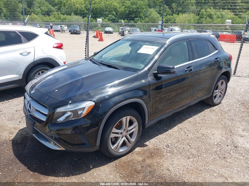 2015 Mercedes-benz Gla-klasse VIN WDCTG4GB0FJ128064 IAAI salvage auction — SIDE, Salvage Title, sold $2,350 on 2026-08-12 (photo 2)