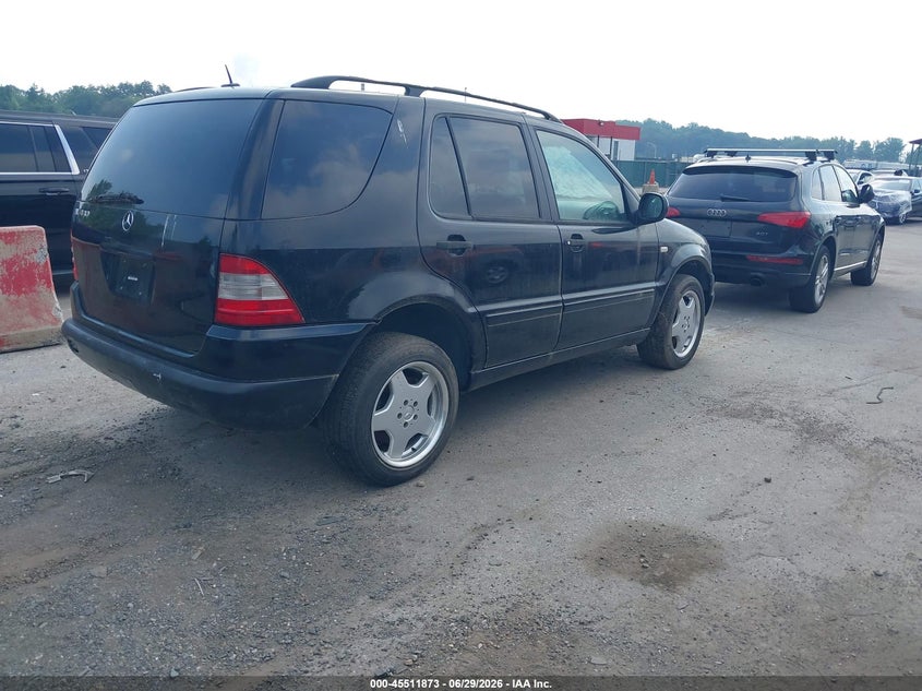 2000 Mercedes-benz Ml-class VIN 4JGAB72E8YA193497 IAAI salvage auction — NORMAL WEAR, Clear (Maryland), sold $375 on 2026-07-09 (photo 4)