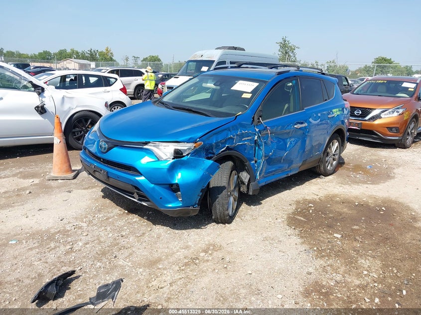 2016 Toyota Rav 4 VIN JTMDJREV4GD037028 IAAI salvage auction — SIDE, Salvage Title, sold $3,050 on 2026-07-23 (photo 2)
