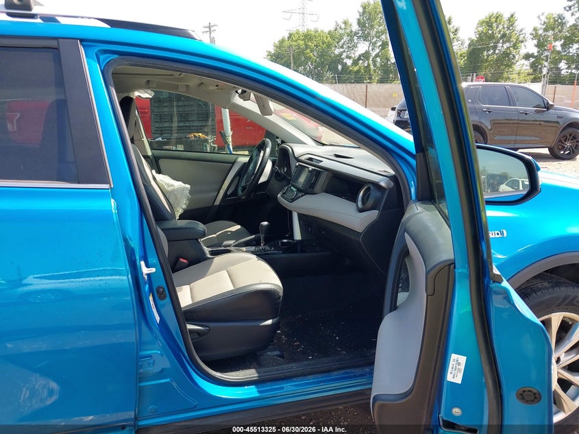 2016 Toyota Rav 4 VIN JTMDJREV4GD037028 IAAI salvage auction — SIDE, Salvage Title, sold $3,050 on 2026-07-23 (photo 5)
