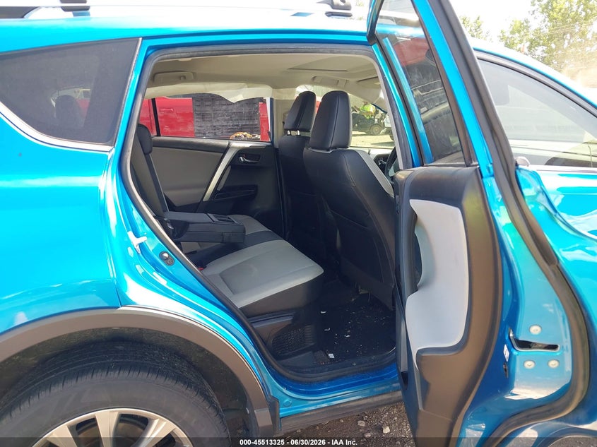 2016 Toyota Rav 4 VIN JTMDJREV4GD037028 IAAI salvage auction — SIDE, Salvage Title, sold $3,050 on 2026-07-23 (photo 8)