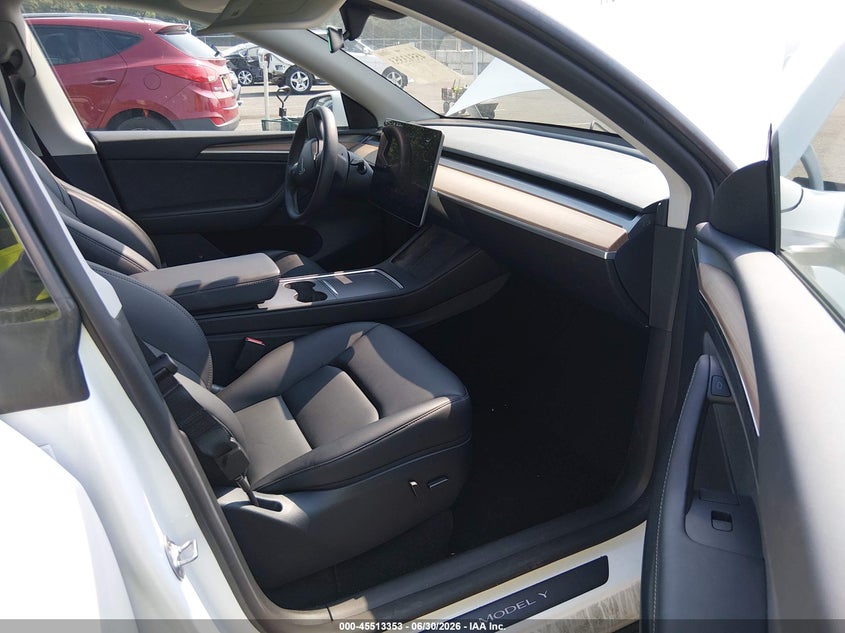 2023 Tesla Model y VIN 7SAYGDEF1PF868932 IAAI salvage auction — FRONT & REAR, Salvage Title, sold $10,950 on 2026-08-27 (photo 5)