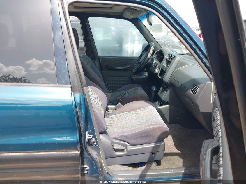2000 Toyota Rav4 VIN JT3GP10V0Y0045502 IAAI salvage auction — NORMAL WEAR, Original (Texas), sold $175 on 2026-07-09 (photo 5)